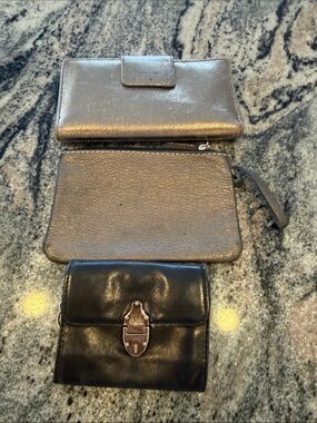 Trio of three purses/wallet